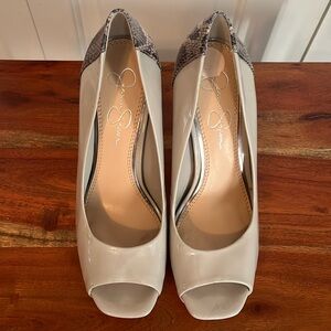 Jessica Simpson nude/snakeskin heels in size 7.5. Lightly used.